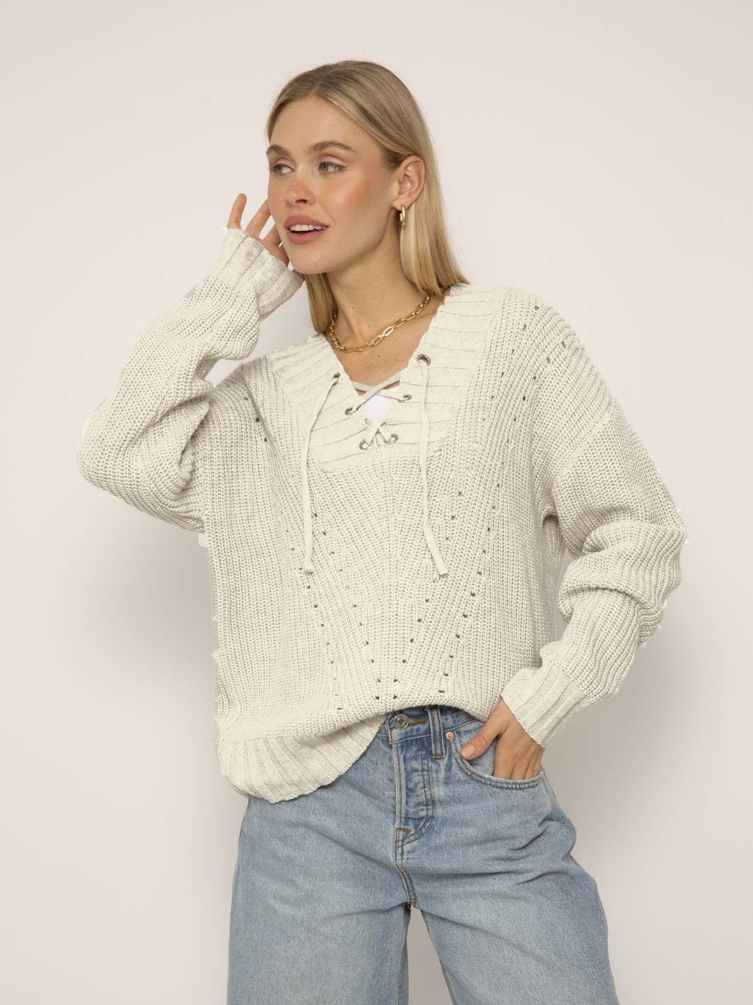 Rosette Pointelle Lace Up Sweater